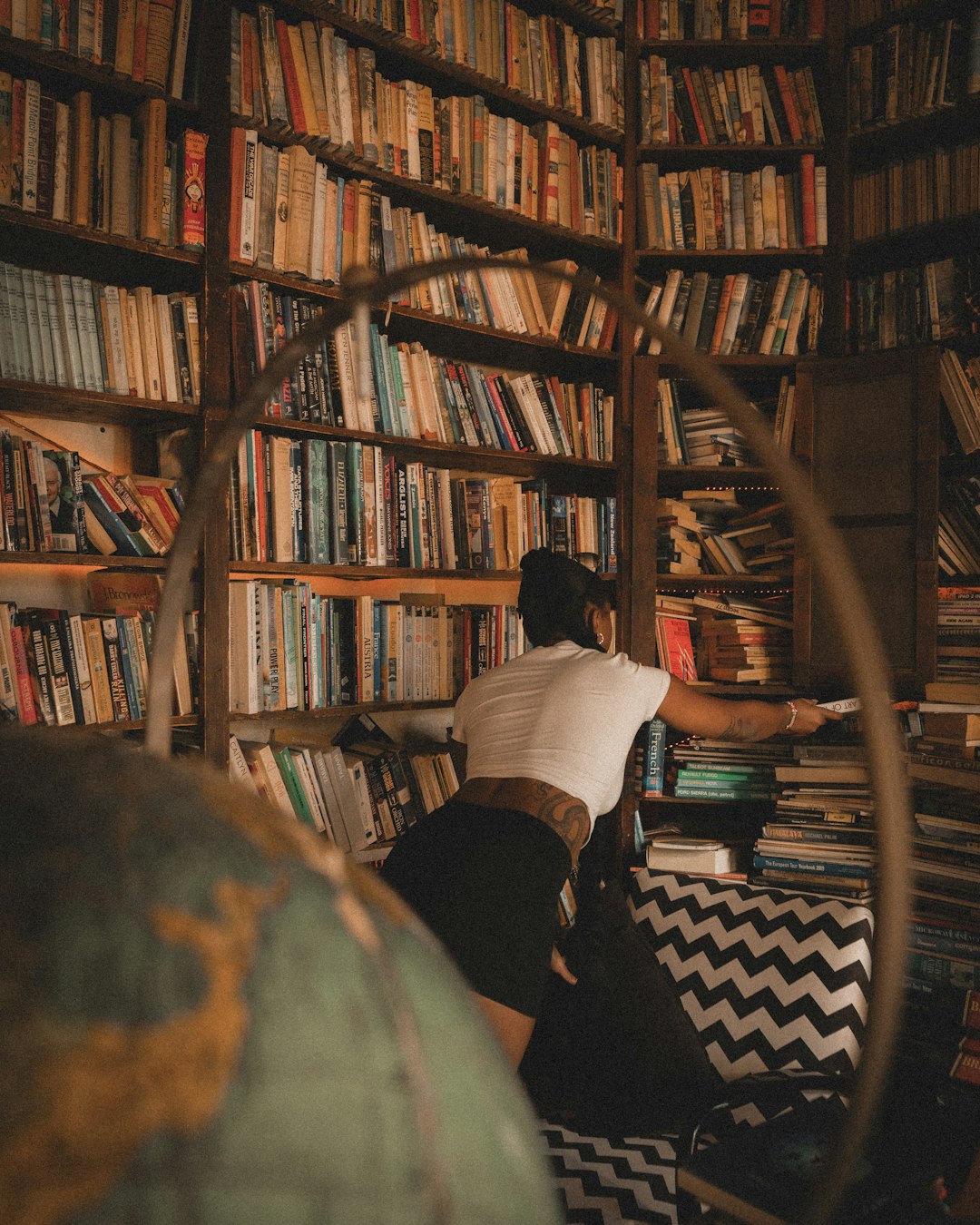 creative shot of a girl in the library